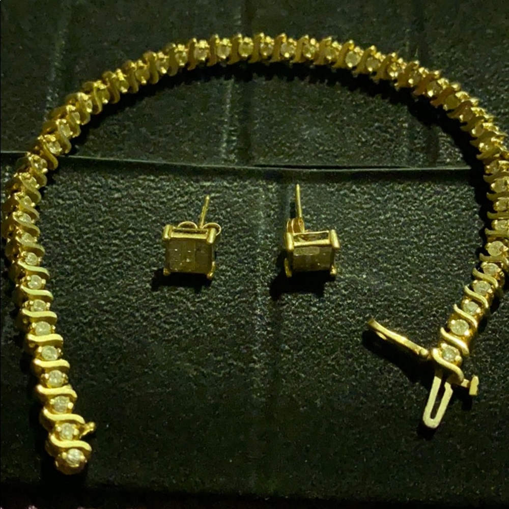 Diamond bracelet and ear rings 14 carat gold